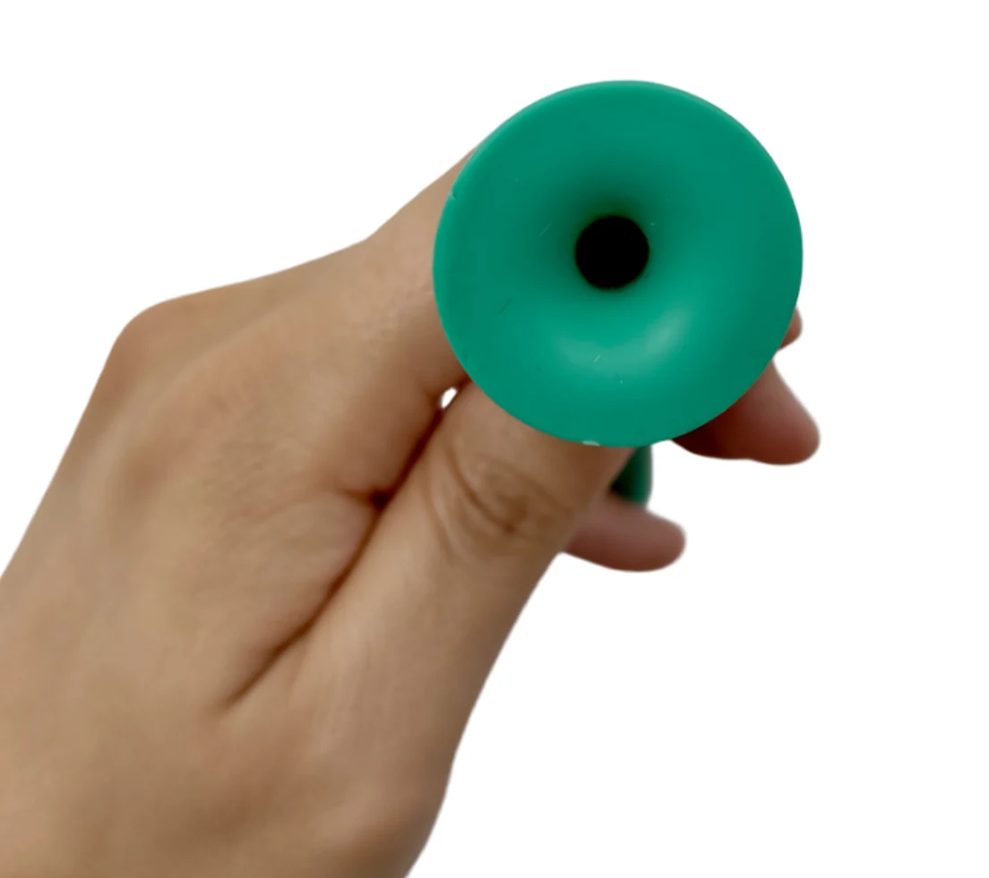 Flange and opening detail of green nasopharyngeal airway